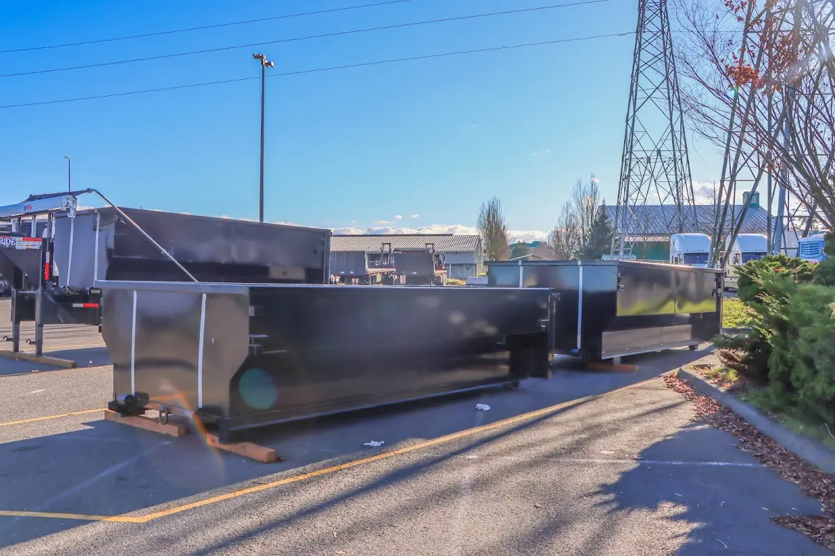 Roll-off dumpster ready for waste disposal at job site for 2 Yard Dumpster Rental in Reidsville